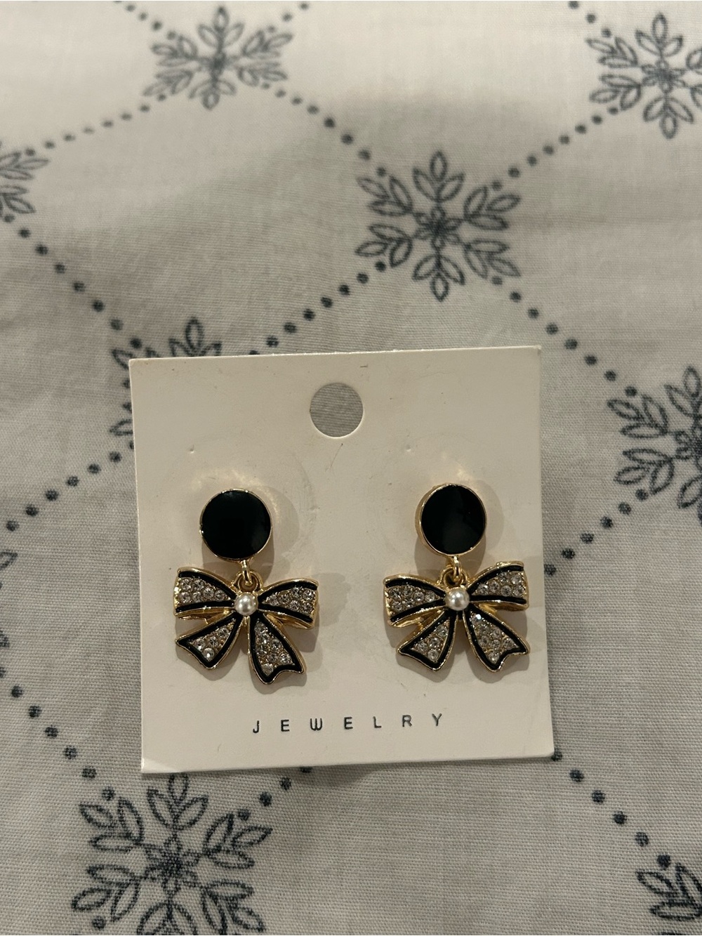 Gold Bow Earrings with Black Accents and Pearl Detail